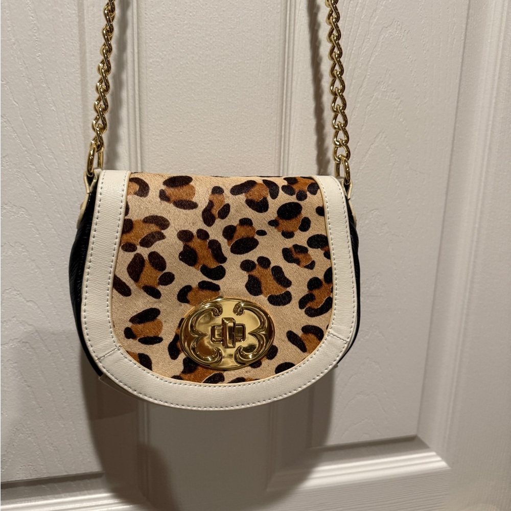 Leopard Fur-Like Crossbody Bag with Gold Accents.